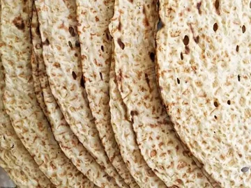 تداوم طرح توزیع نان رایگان در لاهیجان